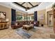 Spacious living room with comfortable seating and ample natural light, perfect for relaxation at 32543 Hawks Lake Ln, Sorrento, FL 32776
