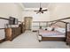 Spacious main bedroom with neutral carpet, tray ceiling and ensuite bathroom offering lots of space and style at 32543 Hawks Lake Ln, Sorrento, FL 32776