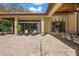 Spacious outdoor patio with elegant seating, perfect for entertaining or enjoying the serene surroundings at 32543 Hawks Lake Ln, Sorrento, FL 32776