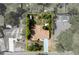 Aerial view of a property highlighting its layout and surrounding landscaping at 3430 Laurel Dr, Mount Dora, FL 32757