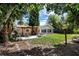 Private backyard featuring a patio with hot tub, perfect for outdoor relaxation at 3430 Laurel Dr, Mount Dora, FL 32757