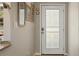 Bright entryway featuring a decorative front door and stylish accents at 3430 Laurel Dr, Mount Dora, FL 32757