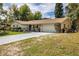 Beautiful single-story home featuring a two-car garage and well-maintained landscaping at 3430 Laurel Dr, Mount Dora, FL 32757