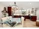 Bright eat-in kitchen with granite counters, an island, updated appliances, and modern lighting at 3430 Laurel Dr, Mount Dora, FL 32757