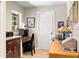 A cozy office featuring tiled floors, lots of natural light, and plenty of desk space at 3430 Laurel Dr, Mount Dora, FL 32757