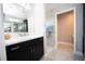 Bathroom with marble countertop vanity and tiled floors at 3532 Thorne Path, Oxford, FL 34484