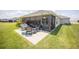 Relaxing screened patio with comfortable seating, ideal for outdoor living at 3532 Thorne Path, Oxford, FL 34484