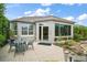 Outdoor seating area on the back patio for relaxing or entertaining at 3537 Cluster Ct, The Villages, FL 32163
