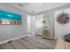 The versatile bonus room provides added space, a large-screen TV, and additional decor at 36700 Oconee Ave, Eustis, FL 32736