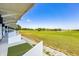 Expansive driving range with well-maintained turf and multiple hitting bays, ideal for practicing your swing at 36700 Oconee Ave, Eustis, FL 32736