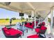 Relaxing driving range with comfortable seating areas, perfect for enjoying a day of practice with friends at 36700 Oconee Ave, Eustis, FL 32736