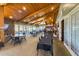 Restaurant interior featuring a bar, tables, and lots of sunlight at 36700 Oconee Ave, Eustis, FL 32736