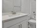 Modern bathroom with white vanity, stylish fixtures, and tiled shower at 5036 Blanket Flower St, Apopka, FL 32712