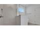 Modern bathroom featuring a glass-enclosed shower and sleek fixtures at 5036 Blanket Flower St, Apopka, FL 32712