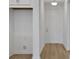 Welcoming entryway with wood-look flooring and a bright white door at 5036 Blanket Flower St, Apopka, FL 32712