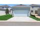 Spacious two-car garage with a clean, level driveway in a residential setting at 5036 Blanket Flower St, Apopka, FL 32712