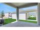View from a covered patio showcasing the backyard and exterior of the home at 5036 Blanket Flower St, Apopka, FL 32712