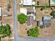 Bird's eye view of a Gathering friendly neighborhood with mature trees, showcasing the property's convenient location and curb appeal at 506 Richard St, Leesburg, FL 34748