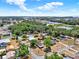 Aerial view of a beautiful neighborhood with established trees, showcasing the desirable location near town at 506 Richard St, Leesburg, FL 34748