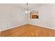 Dining room with hardwood floors and natural light at 5075 China Sea Dr, Tavares, FL 32778