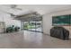Clean garage with lawn equipment and natural light at 5075 China Sea Dr, Tavares, FL 32778