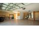Large garage with utility sink and work area at 5075 China Sea Dr, Tavares, FL 32778