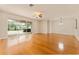 Living area featuring hardwood floors, and a view of the outdoors at 5075 China Sea Dr, Tavares, FL 32778