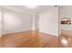 Living room with hardwood floors and neutral colors at 5075 China Sea Dr, Tavares, FL 32778