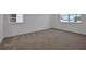 Well-lit bedroom with views of the surrounding neighborhood at 5105 Blanket Flower St, Apopka, FL 32712