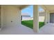 Covered patio area providing a nice outdoor space with grass and landscaping at 5105 Blanket Flower St, Apopka, FL 32712