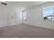 Spacious carpeted bedroom with large windows and ample natural light at 5125 Waypointe Blvd, Apopka, FL 32712