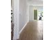 Welcoming entryway featuring wood-look floors and plenty of natural light at 5125 Waypointe Blvd, Apopka, FL 32712