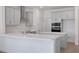 New kitchen boasts a double oven, gray cabinets, and white countertops at 5125 Waypointe Blvd, Apopka, FL 32712