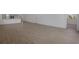 Spacious living room featuring tile flooring and a view of the kitchen in the background at 5125 Waypointe Blvd, Apopka, FL 32712