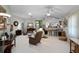 Spacious living room with an open layout, tiled floors, and an inviting atmosphere at 5500 Laver St, Leesburg, FL 34748