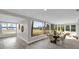 Dining area features a large window offering scenic views and a dining table set for six at 5526 Parkdale Dr, Orlando, FL 32839