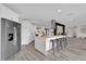 Bright open kitchen features an island, stainless steel appliances, and a large open layout at 5526 Parkdale Dr, Orlando, FL 32839