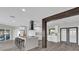 Spacious kitchen features an island with bar stool seating and modern stainless steel appliances at 5526 Parkdale Dr, Orlando, FL 32839