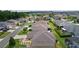 Suburban neighborhood featuring well-maintained lawns and homes at 5596 Cedar Waxwing Dr, The Villages, FL 32163