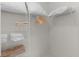 Walk-in closet featuring built-in shelving for storage at 5596 Cedar Waxwing Dr, The Villages, FL 32163