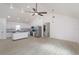 Bright, open kitchen with white cabinets, stainless steel appliances, and a large island at 646 Nw 9Th Ave, Webster, FL 33597