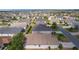 Aerial view of the home, displaying the landscaped backyard in a quiet neighborhood at 744 Shelton St, The Villages, FL 32163