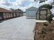 Spacious backyard with a shed and patio, offering ample space for storage and outdoor entertaining at 8025 Cardinal Winds Ln, Mascotte, FL 34753