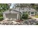 Well-maintained home with a two-car garage and manicured landscaping at 809 Northside Dr, Mount Dora, FL 32757