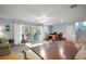 Open living room area with sliding glass doors leading to the outdoor patio at 809 Northside Dr, Mount Dora, FL 32757