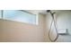 Bright shower with white tiles and frosted window for natural light at 809 Northside Dr, Mount Dora, FL 32757