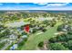 This lovely home is ideally located on a golf course within a lovely lake community; marked for your convenience at 8709 Augusta Ct, Clermont, FL 34711