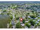 Aerial view of community location, showcasing proximity to amenities and serene lake views at 941 Tarrson Blvd, Lady Lake, FL 32159
