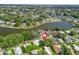 Aerial view of a lakeside community, showcasing the home's prime location near the water at 941 Tarrson Blvd, Lady Lake, FL 32159