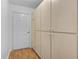 Hallway with storage and door to the outside at 9461 Se 173Rd Ln, Summerfield, FL 34491